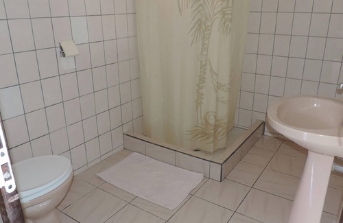 Le Robert Apartment | Homerez - Apt. Central in Le Robert, Garden View.