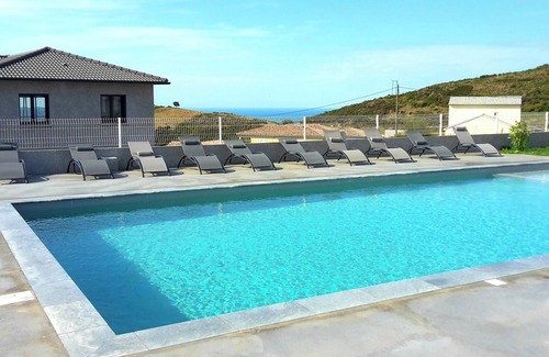 Olmeta-di-Tuda Apartment | Homerez - Charming Apartment in Olmeta di Tuda with Shared Pool