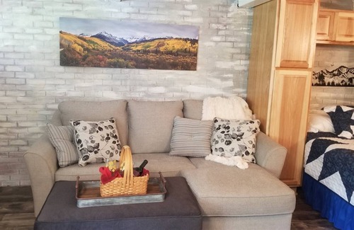 Glenwood Springs Condo | Homey and cozy with a large table for great feasts or epic card games.