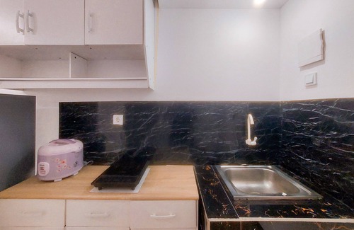 South Tangerang Apartment | Homey and Restful Studio Urbantown Serpong Apartment