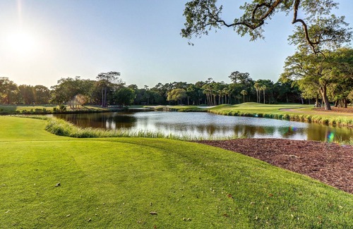 West Beach House | Homey cottage with pool near beach access & golf