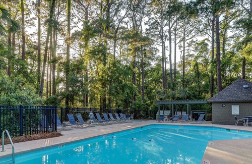 West Beach House | Homey cottage with pool near beach access & golf