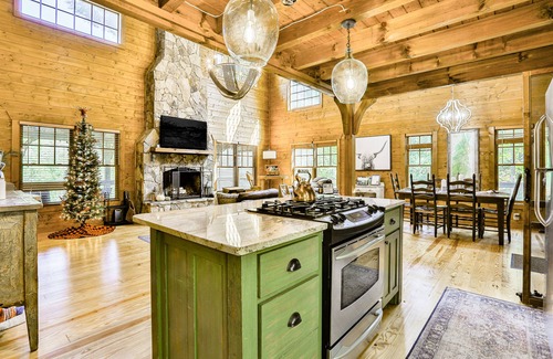Young Harris Cabin | Homey riverfront cabin with hot tub, grill, wood fireplace, AC, & scenic views