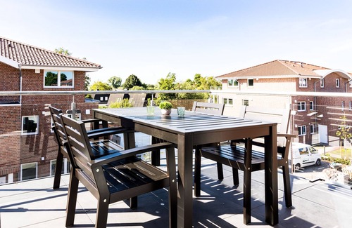 Wangerland Apartment | Hookser Perle: Modern hygge penthouse directly behind the dyke