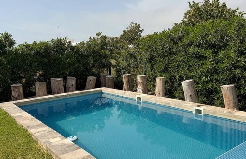 Ica House | HOP Oasis: Lagoon View & Unique Architecture