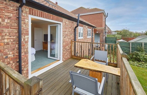 Brotton House | Host & Stay | Coach Cottage