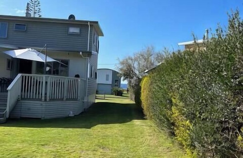 Cooks Beach House | Hosts on the Coast Reel Escape on Banks