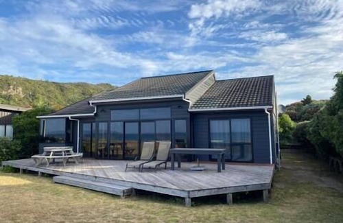 Matarangi House | Hosts on the Coast shimmering on the Shore