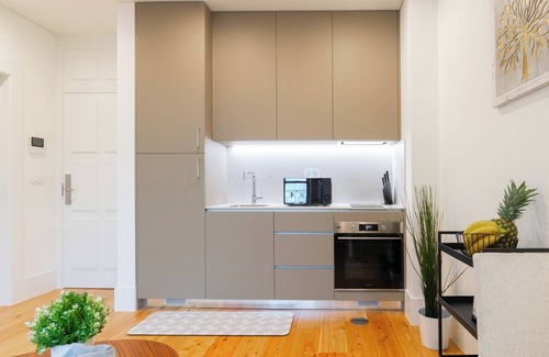 Guimaraes Apartment | HostWise - Bright and Cozy Flat w/Balcony