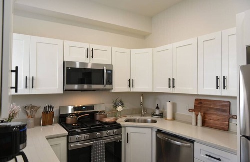 Lower Lawrenceville House | *HostWise Stays* - Pet Friendly, Patio, Great for Long Stays!