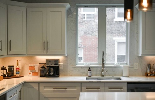 Lower Lawrenceville House | ★ HostWise Stays ★ Rooftop patio, King Bed, Garage Parking, Prime Location!