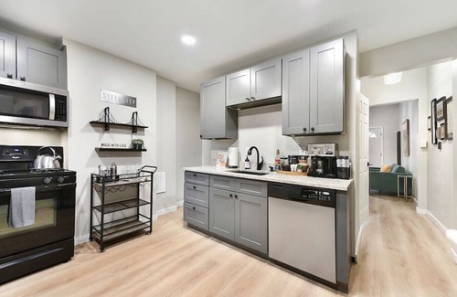 Lower Lawrenceville House | ★ HostWise Stays ★ Stunning Remodel, Off-Street Parking, Amazing Location!