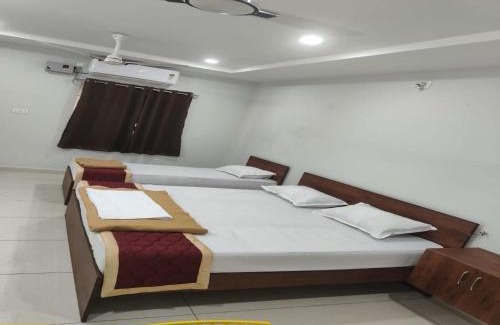 Nellore Hotel | Hotel O Mini Bypass Nellore Road Formerly AMR Guest Inn