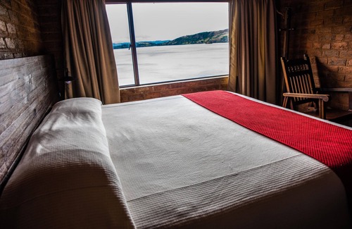 Aquitania Hotel | Hotel refugio pozo azul