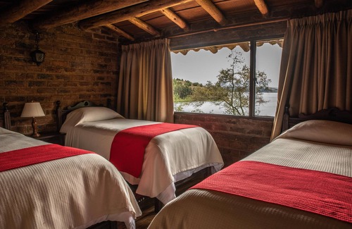 Aquitania Hotel | Hotel refugio pozo azul