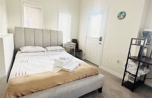 Guelph House | Hotel style private main level if townhome