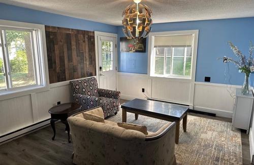 Biddeford Apartment | House dwelling that combines The bedroom kitchen and living area into one space