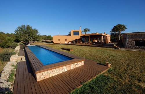 Formentera House | House House-Villa with pool, overlooking Ibiza, fields with olive and private forest