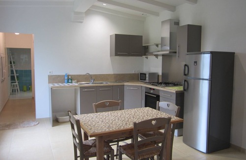 Coutras House | House in a green setting