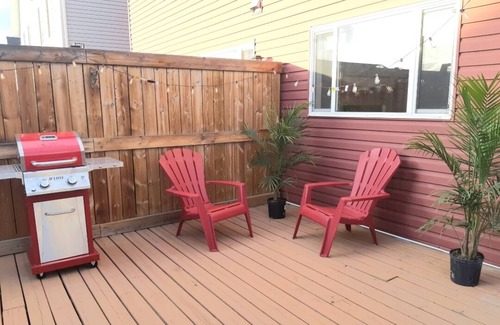 Southeast Edmonton House | House in Summerside with a huge patio and an extra tall garage