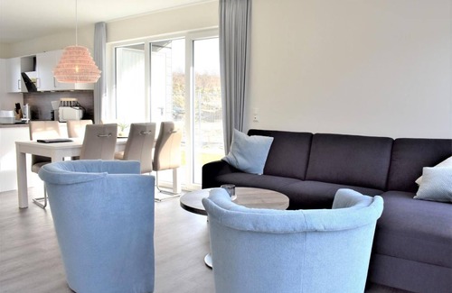 Schillig House | House No. 16, Ferienhaus Deichgraf - Modern vacation home, sauna, south-facing terrace,