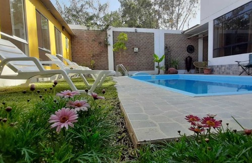 Ica House | house with garden and pool overlooking the dunes.