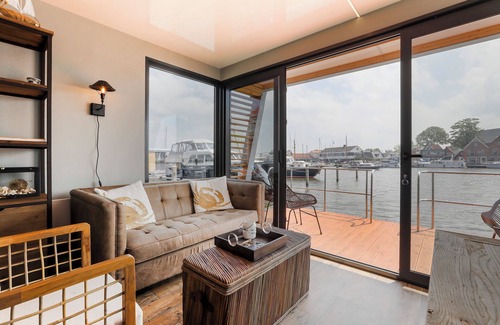 Grou Boat Rental | Houseboat Smuk, enjoy from your own outdoor terrace and water views.