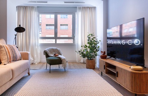 Nueva Espana Apartment | Housing Castellana X X I I I by Sharing Co