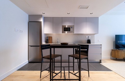 Nueva Espana Apartment | Housing Castellana X X I I by Sharing Co