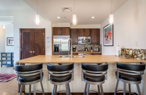 Downtown Steamboat Springs Condo | Howelsen Place B211 | Downtown Condo | Private Heated Garage | Fire Pit With Views