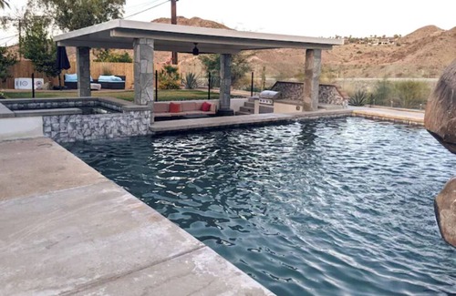Cathedral City Cove House | Huge Home: Pool, Grotto, Water Slide, Swim Up Bar, Hot Tub, Fire Pit, Game Room