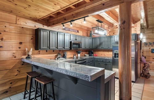 Sevierville Cabin | HUGE THEATER with Stadium Seating, Resort Pool, Hot Tub, Pool Table, Views