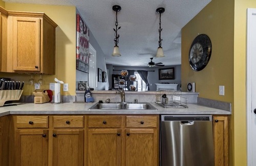 Mount Mourne House | Hummingbird Manor - Relax in Hot Tub in Private Backyard with fire pit area