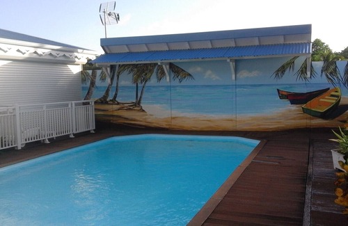 Le Marin House | Ideal T2 bungalow very well equipped, with swimming pool under a starry sky.