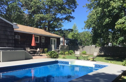 Bellport Cottage | Immaculate Bellport village cottage vacation home w/ Pool, Hot Tub, bikes & Maid