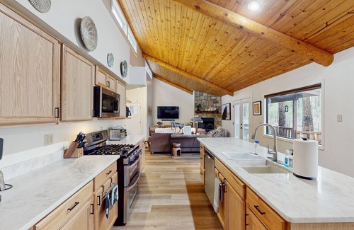 Pinetop House | Immerse yourself in the charm of this delightful cabin tucked among the pines