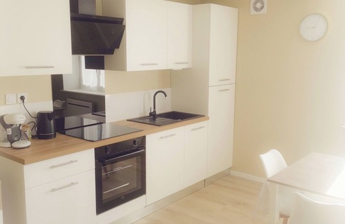 Saint-Germain-Lespinasse Apartment | In a peaceful village, superb 2-bedroom apartment with private courtyard