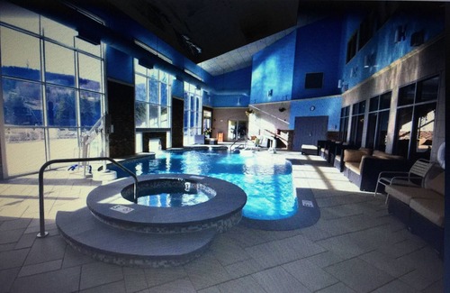 Hancock Condo | IN/OUT SKIING CONDO , POOL, MOVIE THEATER/KIDS ACTIVITIES