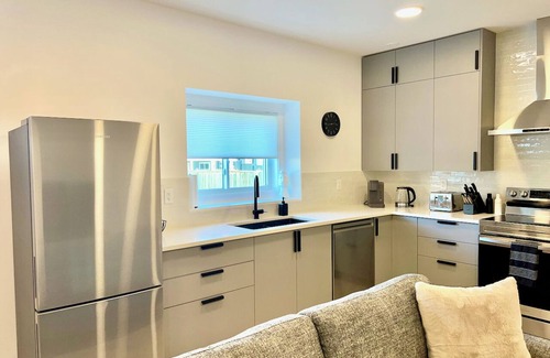 Prince George House | Inclusively Home Ltd. - Spacious and Stylish Basement Suite with King Roomn