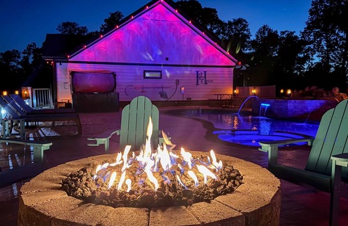 Sevierville Cabin | Incredible Heated Pool Oasis | Game Room | Hot tub