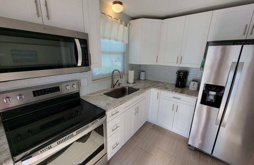 Mid Island House | Indian Bayou Lake House 1 - Lakeside Oasis