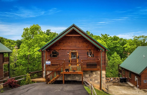 Pigeon Forge Cabin | Indoor Pool-Theater-Bunk Beds with Slide-Game Room-Hot Tub-5 min to Attractions!
