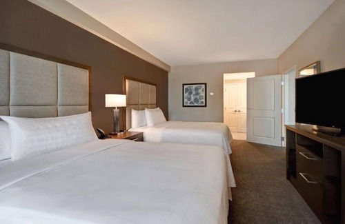 Florida Central Atlantic Coast Hotel | Indulge in Home Like Comfort! Full Kitchen, Outdoor Pool, Pets Allowed!