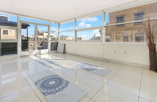 Historic Core House | Industrial-Chic DTLA Loft with Rooftop & City Views | Skyline Lofts by AvantStay