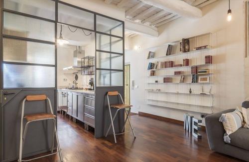 Rione III Colonna Apartment | Industrial Chic Loft Apartment in Historical Building