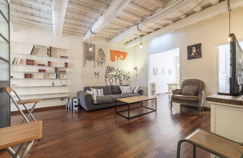 Rione III Colonna Apartment | Industrial Chic Loft Apartment in Historical Building