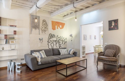 Rione III Colonna Apartment | Industrial Chic Loft Apartment in Historical Building
