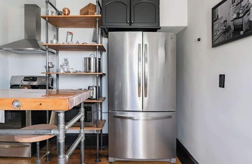 Truxton Circle Condo | Industrial Loft Offers Historic Feel with Modern Amenities
