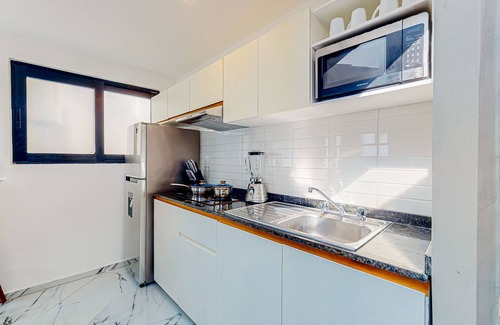 Downtown Cancun Hotel | Inviting apartment with pool, full kitchen, convenient location