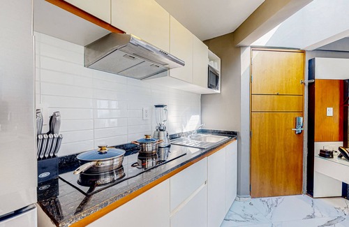 Downtown Cancun Hotel | Inviting apartment with pool, full kitchen, convenient location